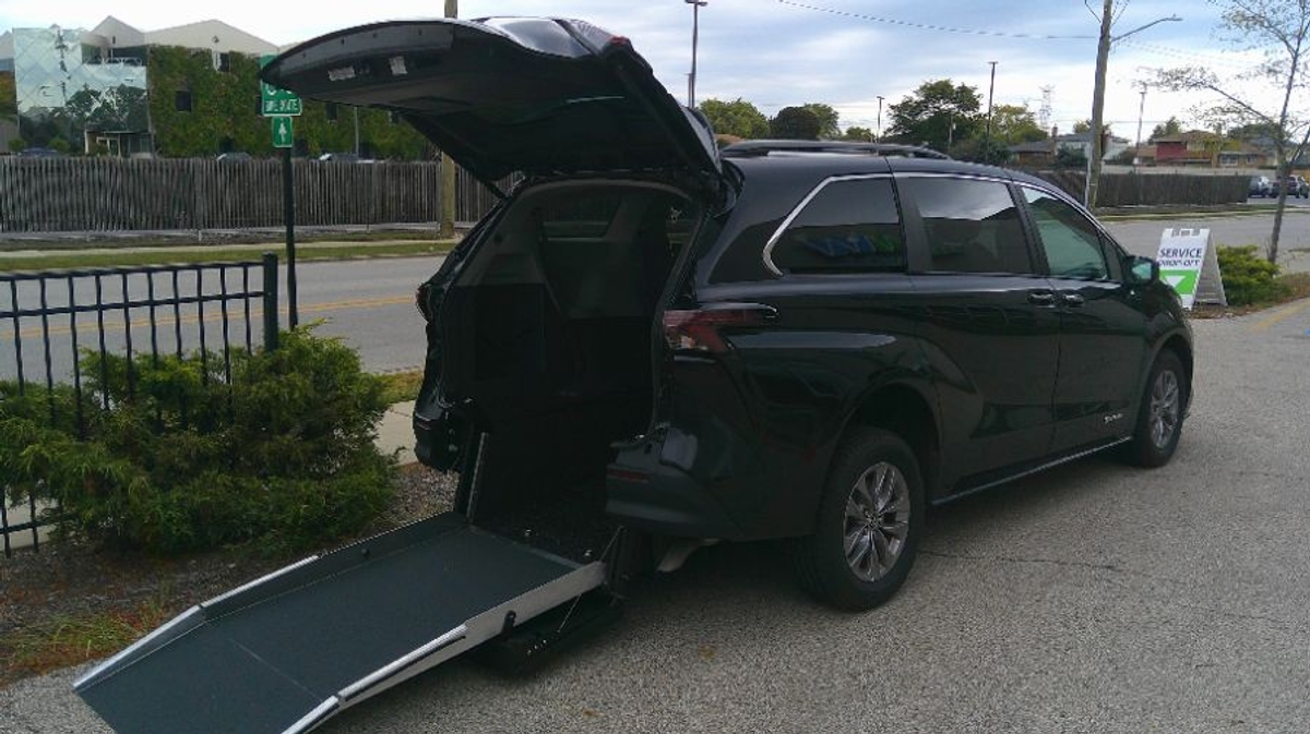 Black Toyota Sienna with Rear Entry Manual Fold Out ramp