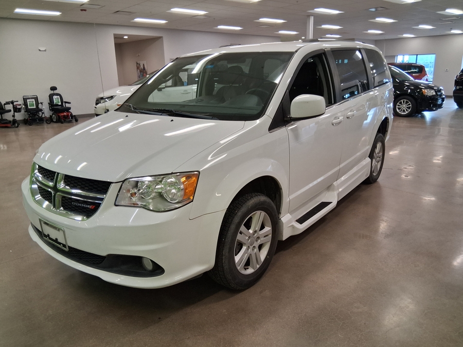 White Dodge Grand Caravan with Side Entry Automatic Fold Out ramp