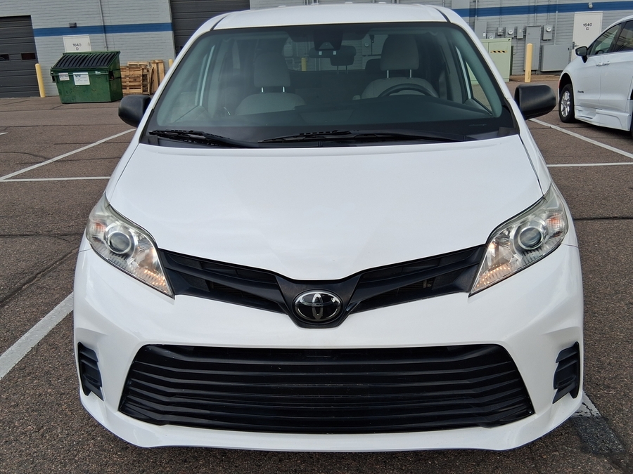 White Toyota Sienna with Rear Entry Manual Fold Out ramp