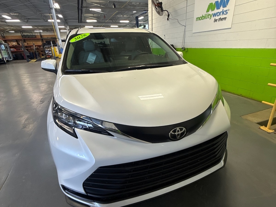 White Toyota Sienna with Rear Entry Manual Fold Out ramp