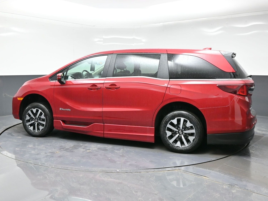 Red Honda Odyssey with Side Entry Automatic In Floor ramp
