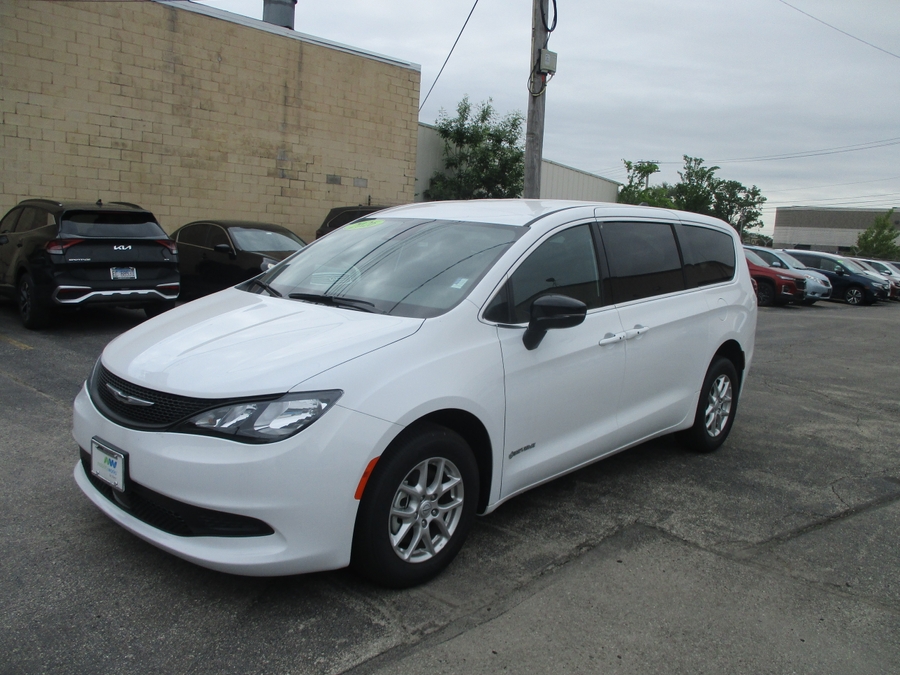 White Chrysler Voyager with Side Entry Automatic Fold Out ramp