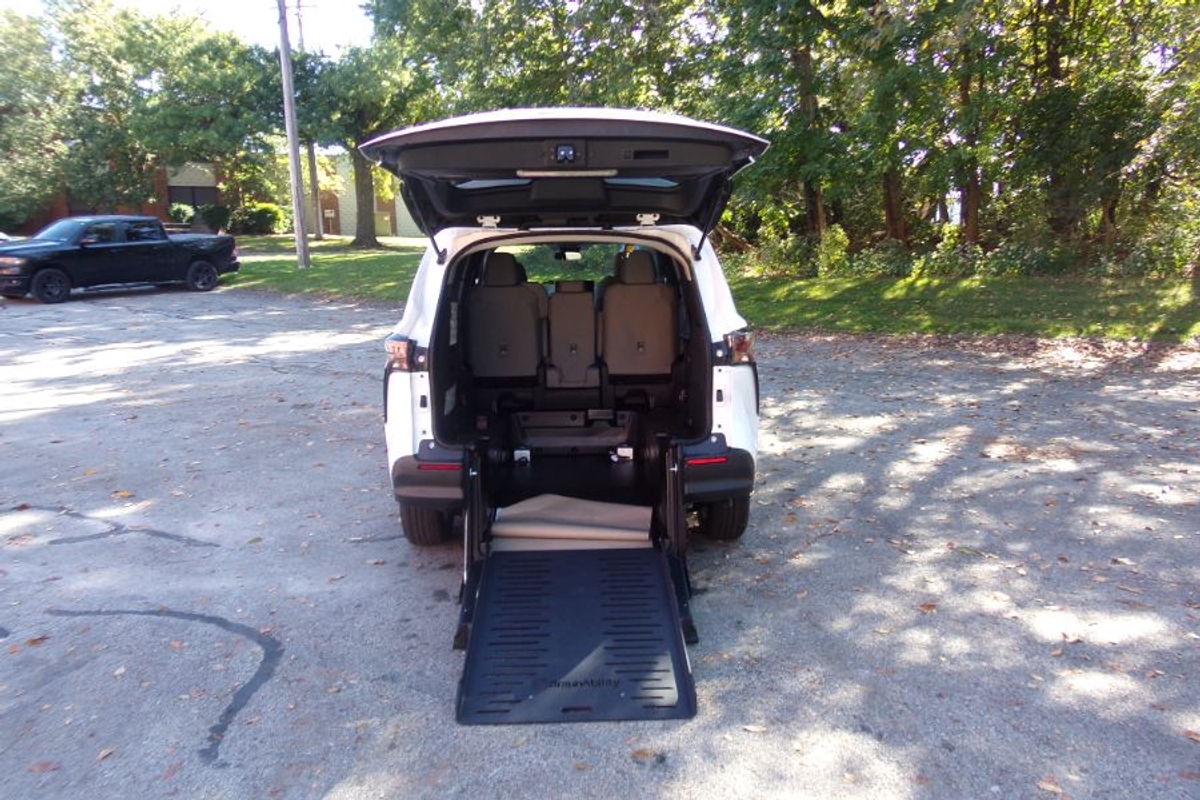 White Toyota Sienna with Rear Entry Manual Fold Out ramp
