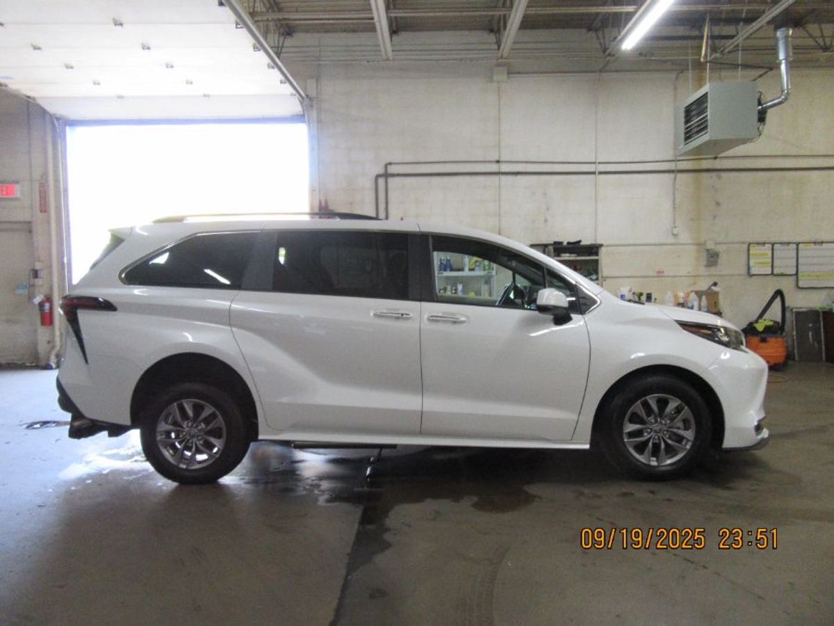 White Toyota Sienna with Rear Entry Manual Fold Out ramp