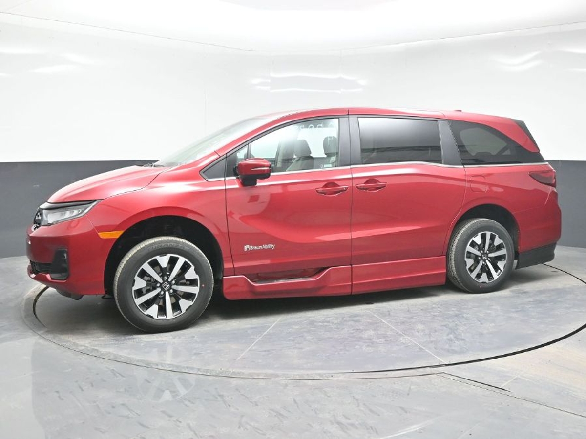 Red Honda Odyssey image number 2