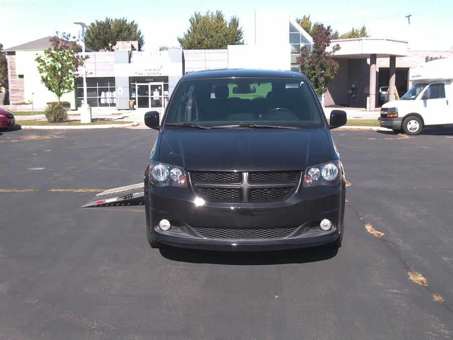 Silver Dodge Grand Caravan with Side Entry Automatic In Floor ramp