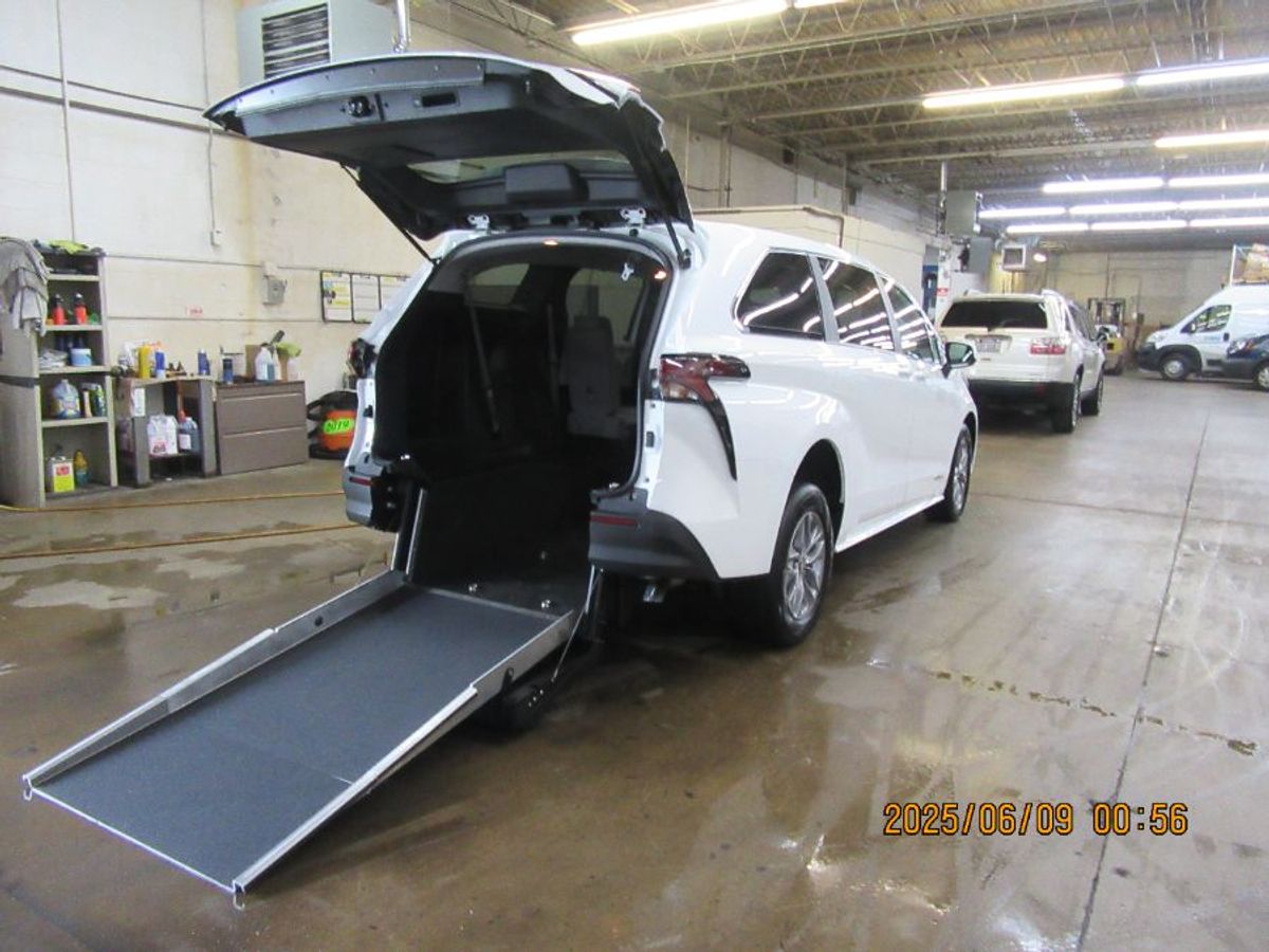 White Toyota Sienna with Rear Entry Manual Fold Out ramp