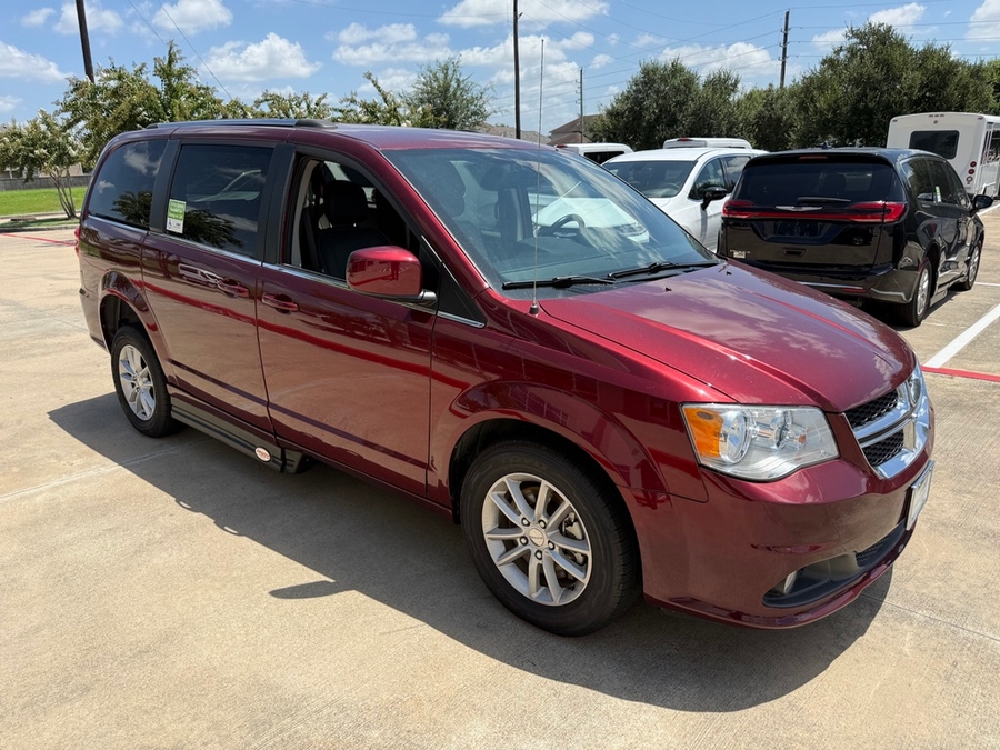 Red Dodge Grand Caravan with Side Entry Automatic Fold Out ramp
