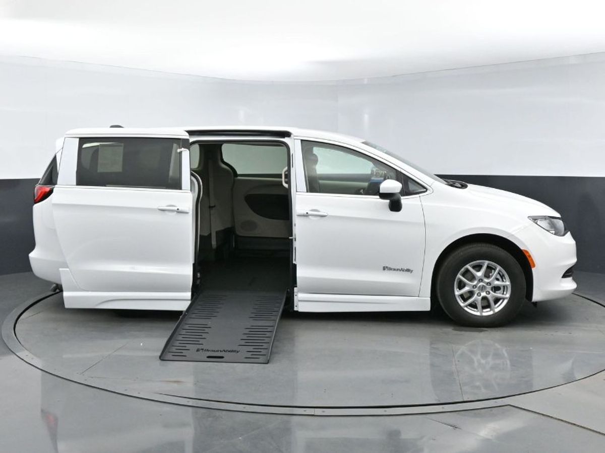 White Chrysler Voyager with Side Entry Automatic Fold Out ramp