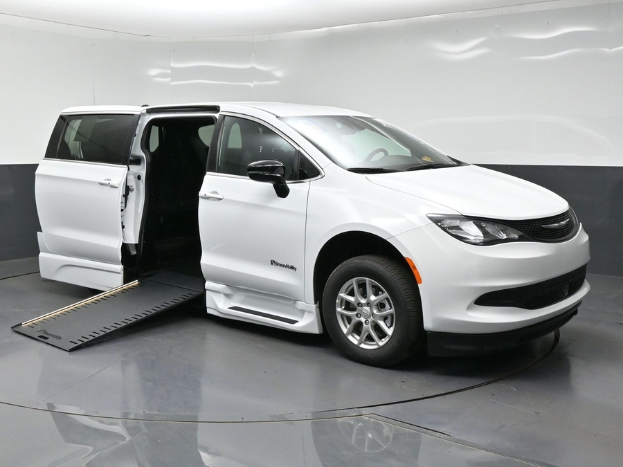 White Chrysler Voyager with Side Entry Automatic In Floor ramp