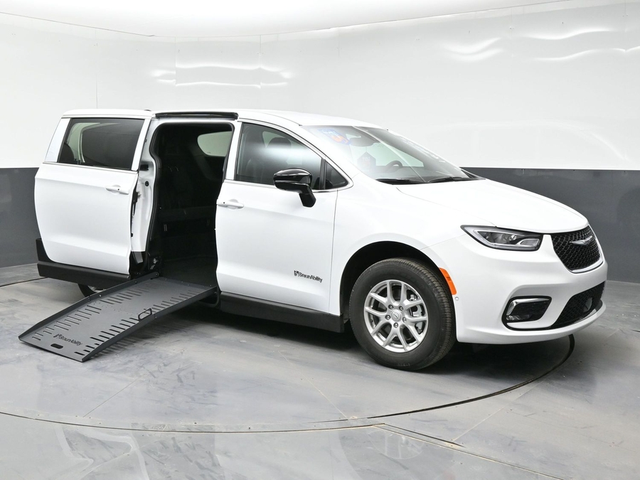 White Chrysler Pacifica with Side Entry Manual Fold Out ramp