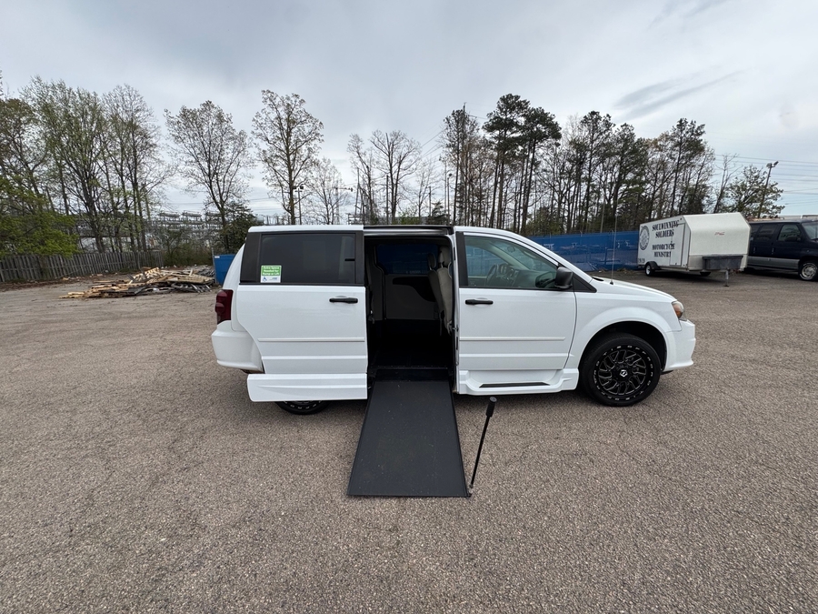 White Dodge Grand Caravan with Side Entry Automatic In Floor ramp