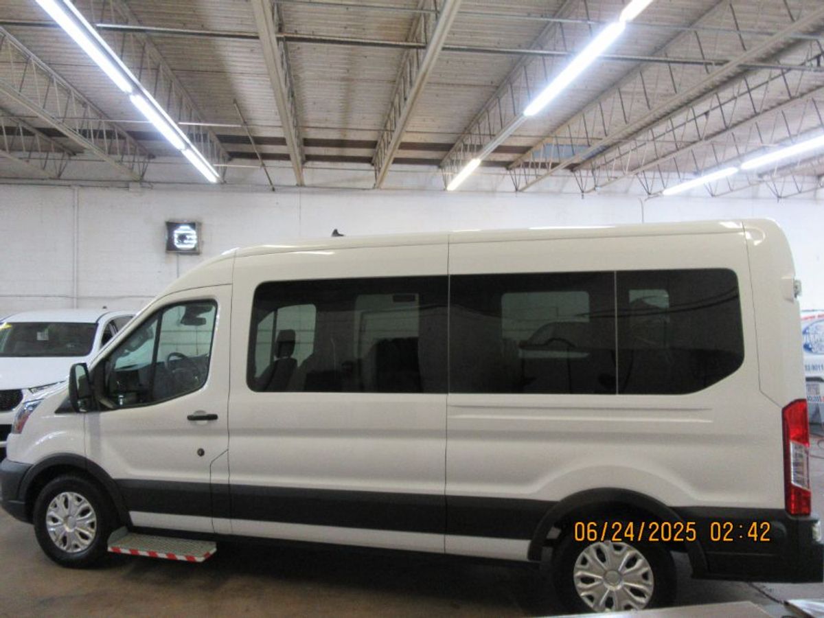 White Ford Transit with N/A N/A N/A ramp