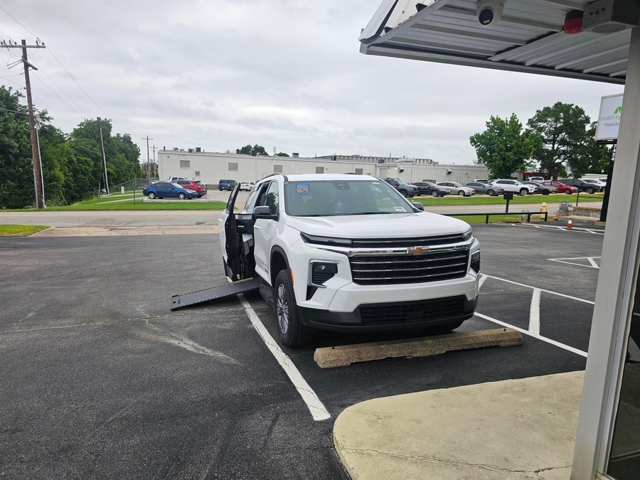 White Chevrolet Traverse with Side Entry Automatic In Floor ramp