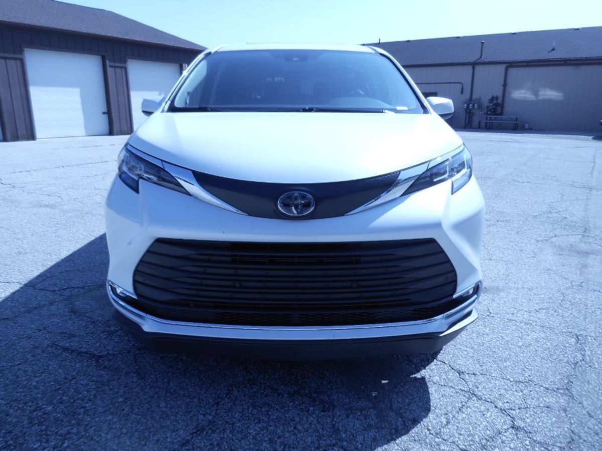 White Toyota Sienna with Side Entry Automatic Fold Out ramp