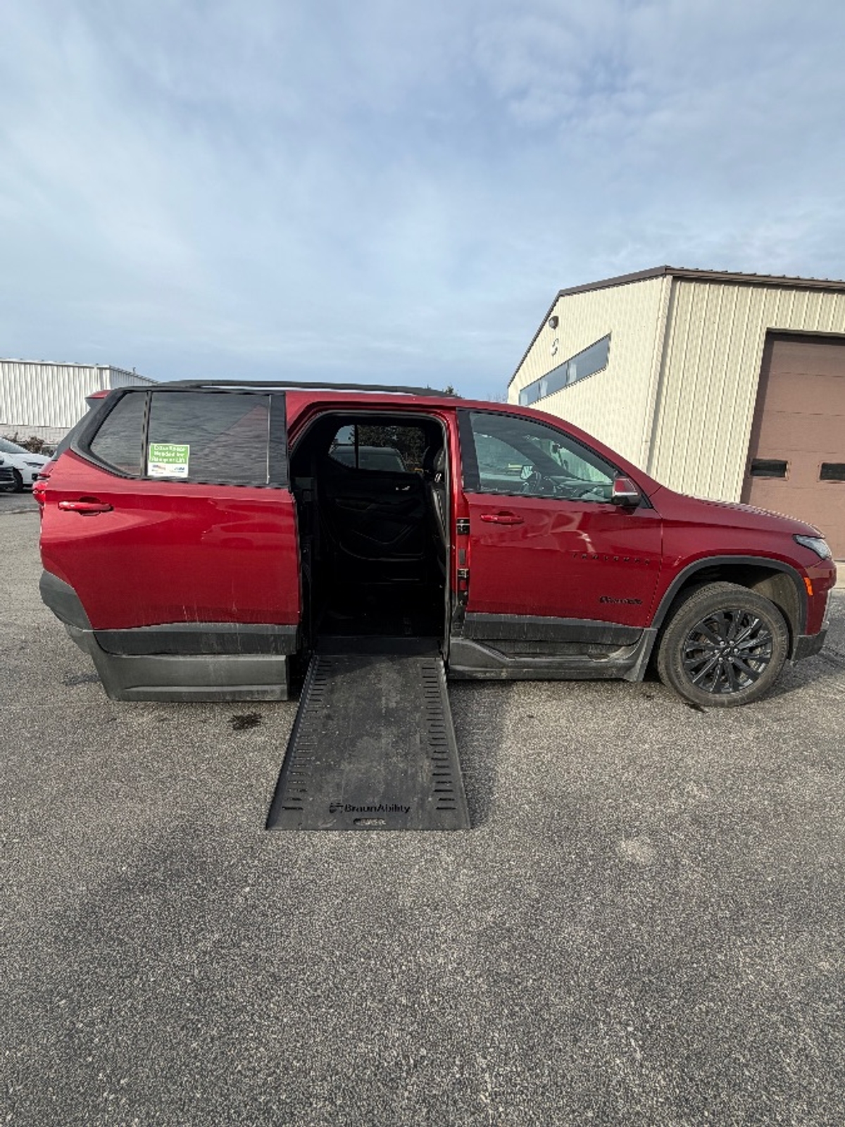 Red Chevrolet Traverse with Side Entry Automatic In Floor ramp