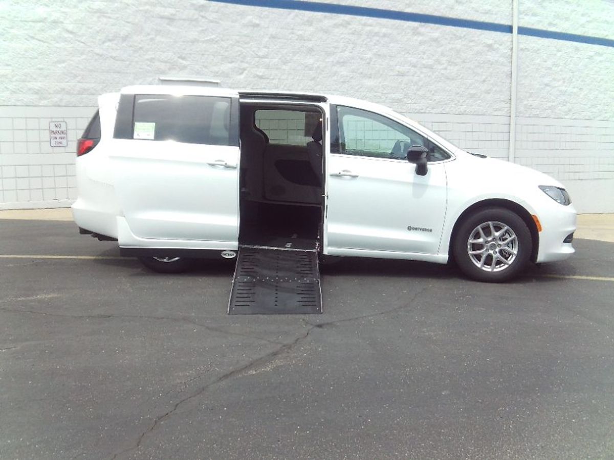 White Chrysler Voyager with Side Entry Automatic Fold Out ramp