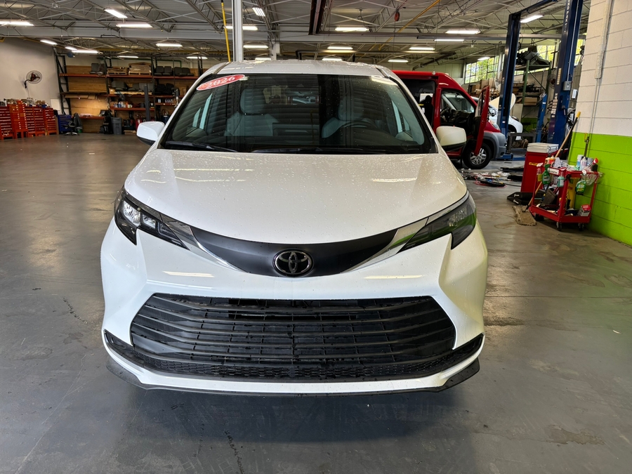 White Toyota Sienna with Rear Entry Manual Fold Out ramp
