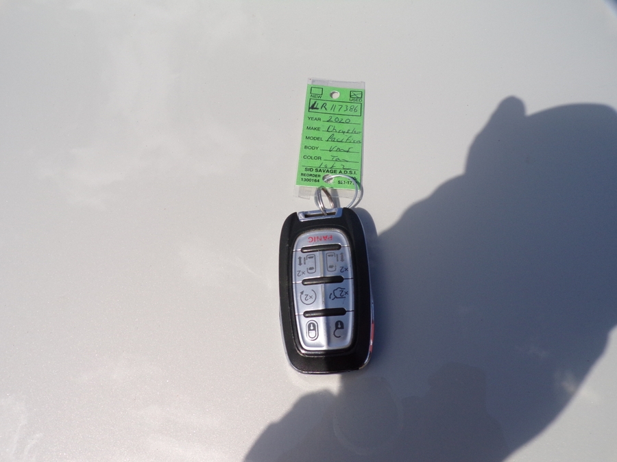 White Chrysler Pacifica with Side Entry Automatic In Floor ramp