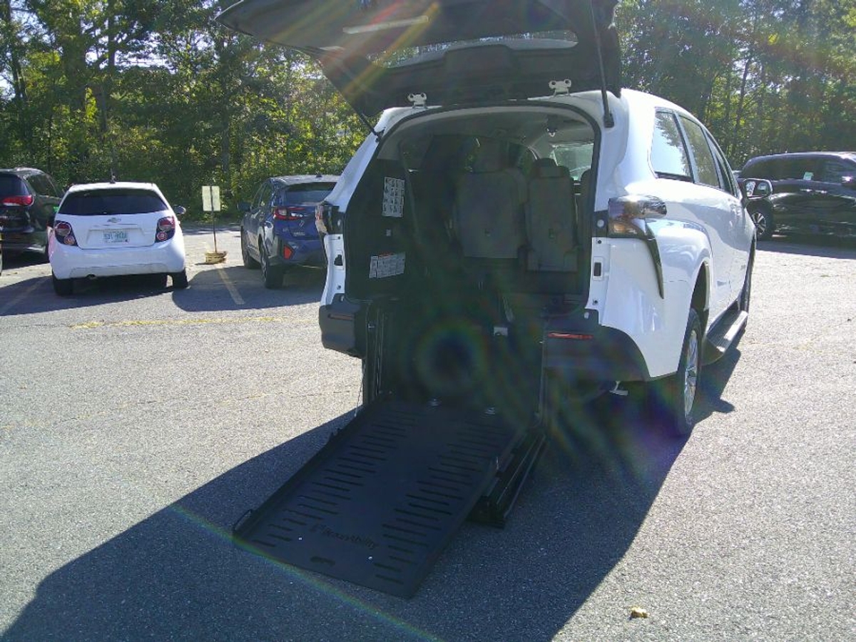 White Toyota Sienna with Rear Entry Manual Fold Out ramp