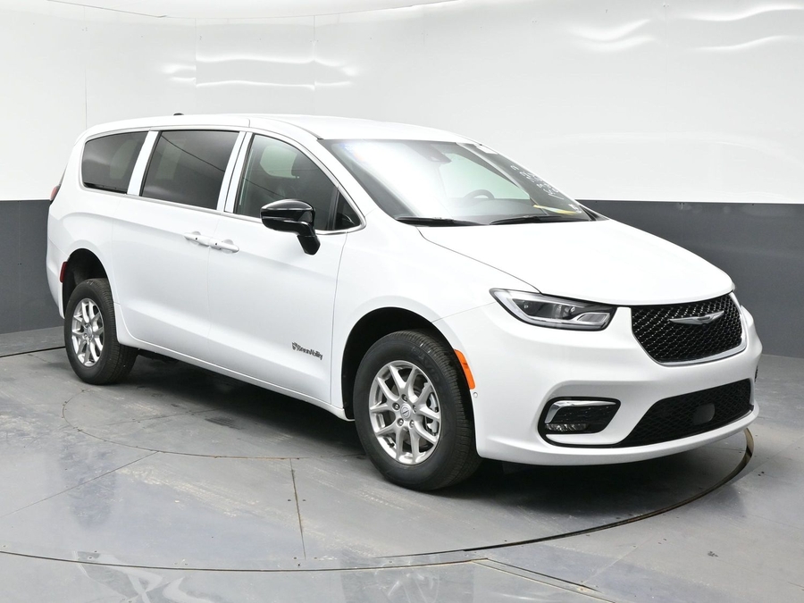 White Chrysler Pacifica with Rear Entry Manual Fold Out ramp