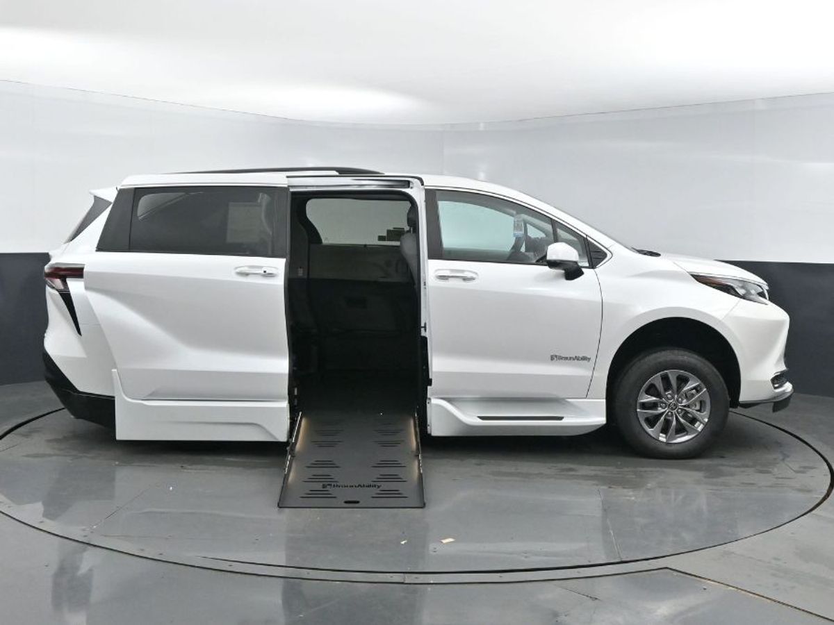 White Toyota Sienna with Side Entry Automatic Fold Out ramp