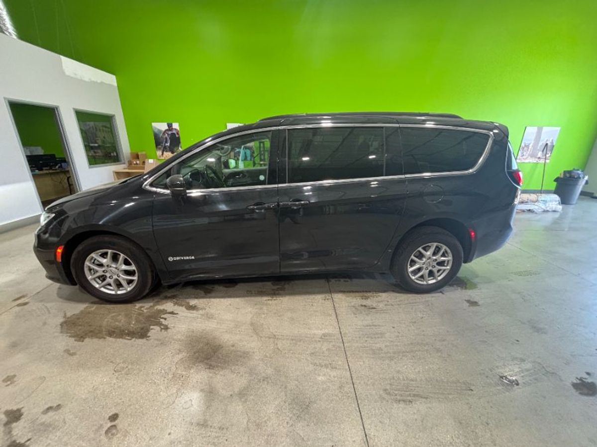 Black Chrysler Pacifica with Rear Entry Manual Fold Out ramp