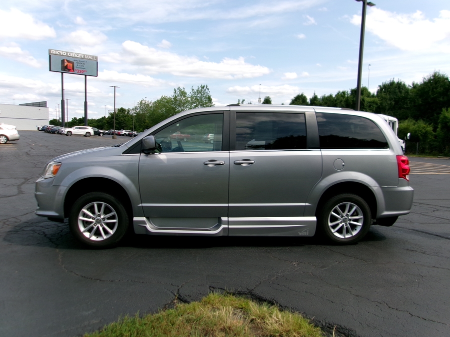 Silver Dodge Grand Caravan with Side Entry Automatic In Floor ramp
