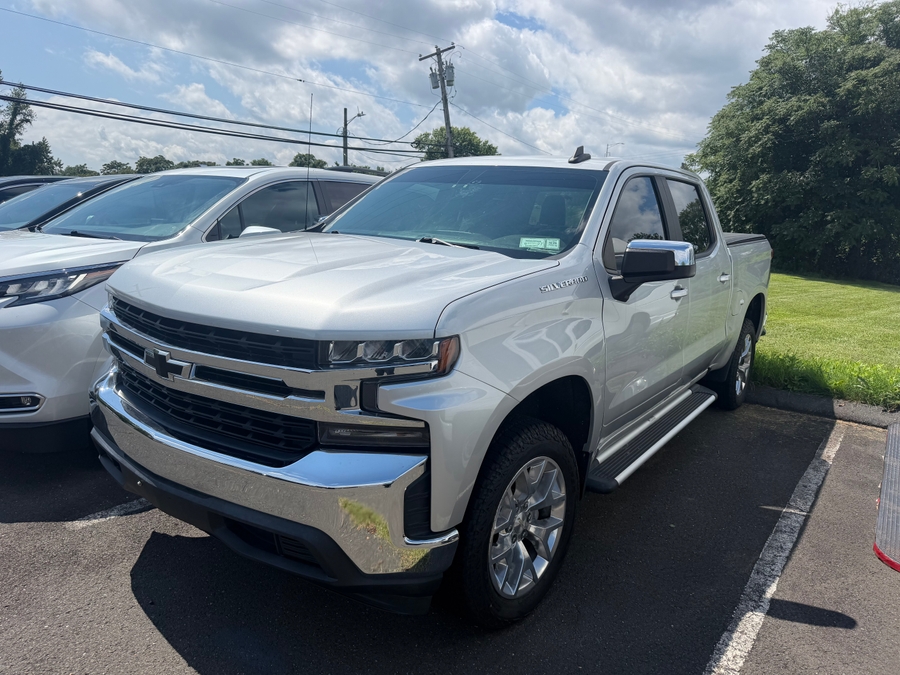 Silver Chevrolet Silverado 1500 with Side Entry Automatic Fold Out ramp
