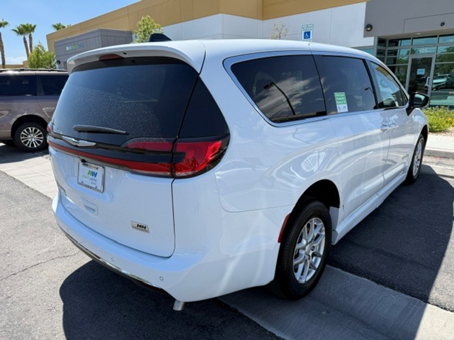 White Chrysler Pacifica with Side Entry Automatic Fold Out ramp