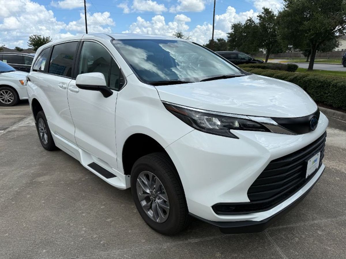 White Toyota Sienna with Side Entry Automatic Fold Out ramp