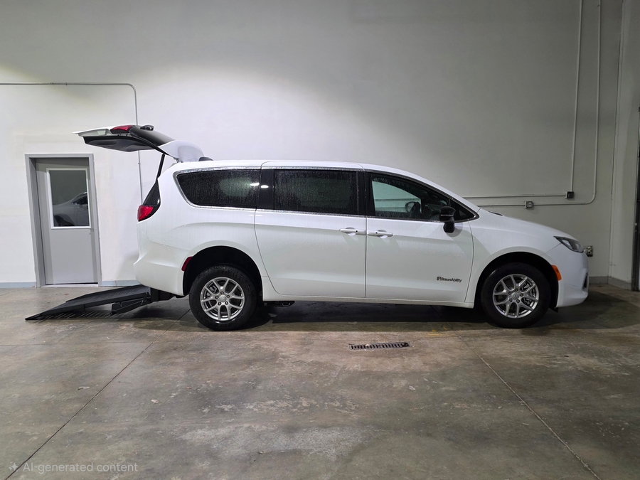White Chrysler Voyager with Rear Entry Manual Fold Out ramp