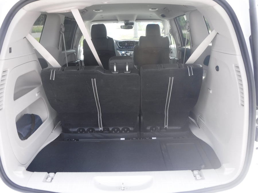 White Chrysler Pacifica with Side Entry Automatic In Floor ramp