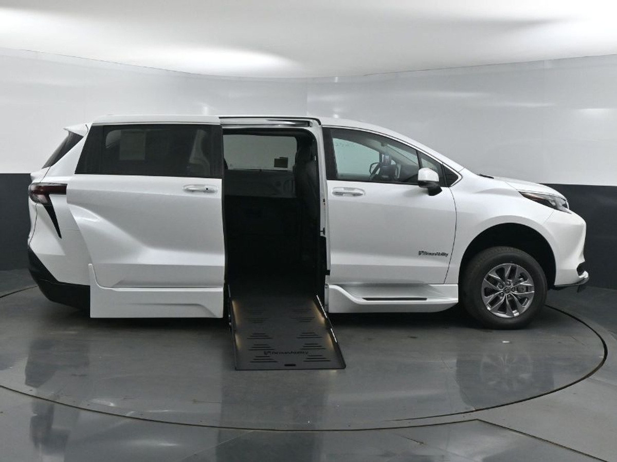 White Toyota Sienna with Side Entry Automatic Fold Out ramp