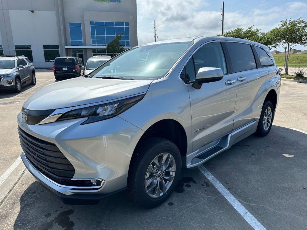 Silver Toyota Sienna with Side Entry Automatic Fold Out ramp