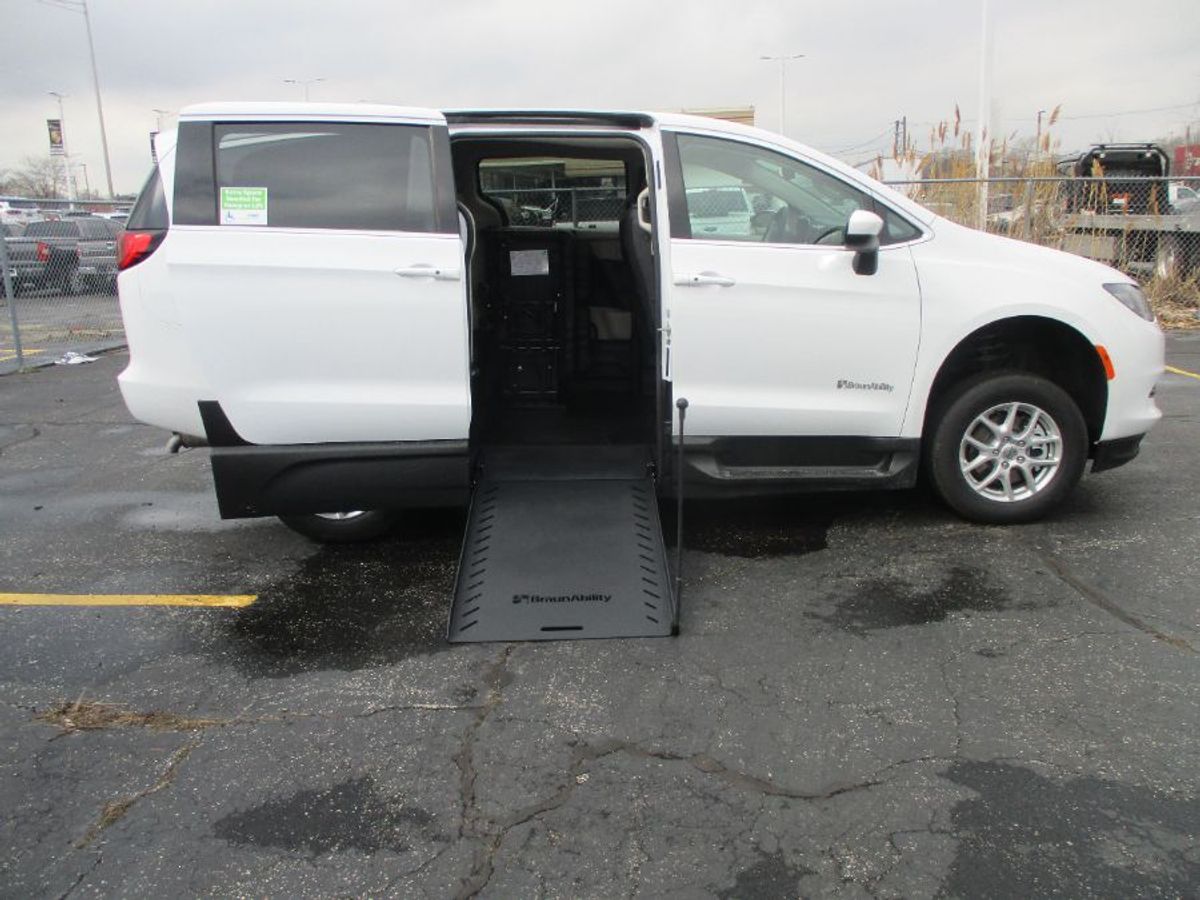 White Chrysler Voyager with Side Entry Manual In Floor ramp