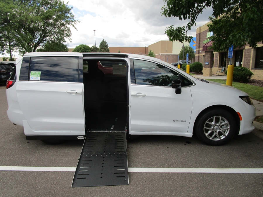 White Chrysler Voyager with Side Entry Automatic Fold Out ramp