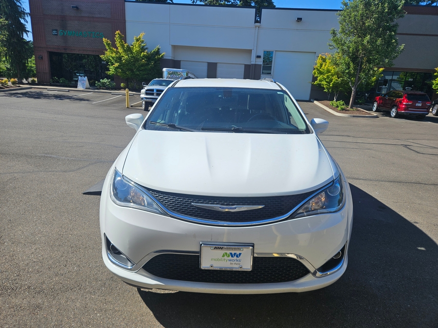 White Chrysler Pacifica with Side Entry Automatic In Floor ramp