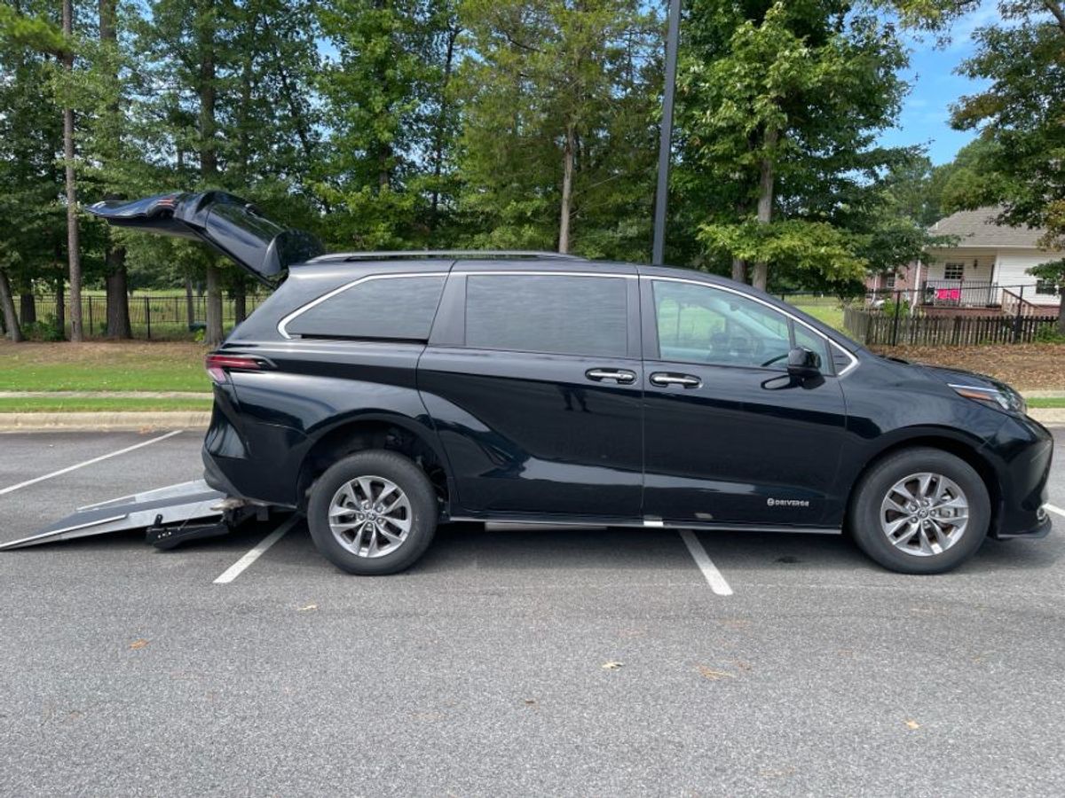 Black Toyota Sienna with Rear Entry Manual Fold Out ramp