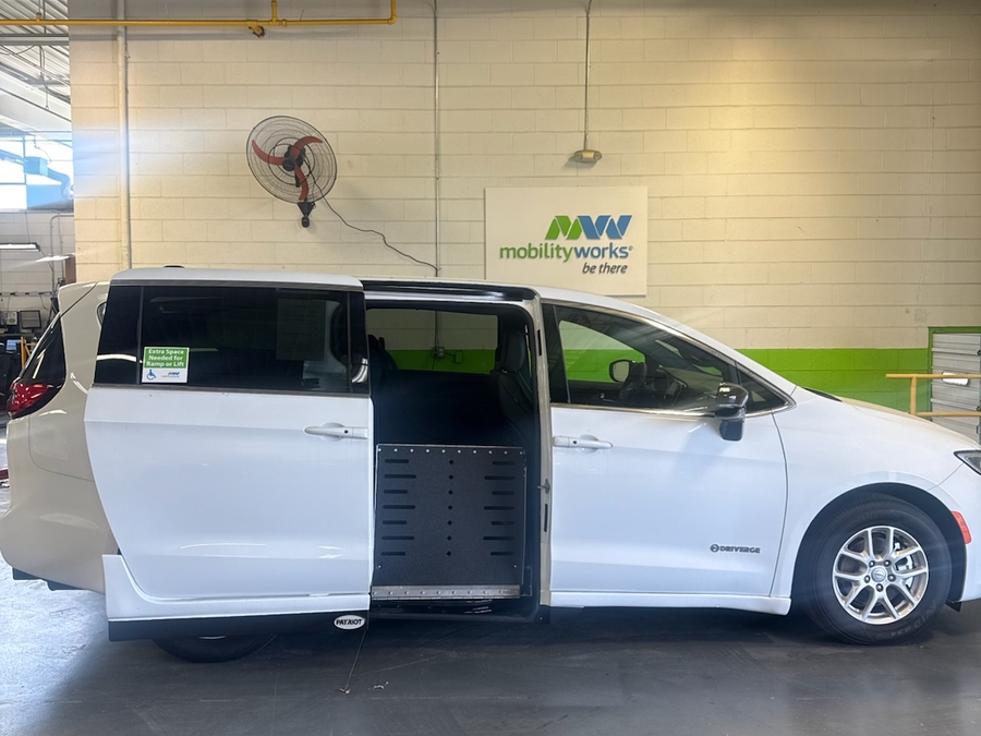 White Chrysler Pacifica with Side Entry Automatic Fold Out ramp