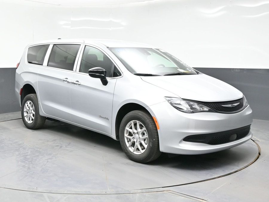 Silver Chrysler Voyager with Rear Entry Manual Fold Out ramp