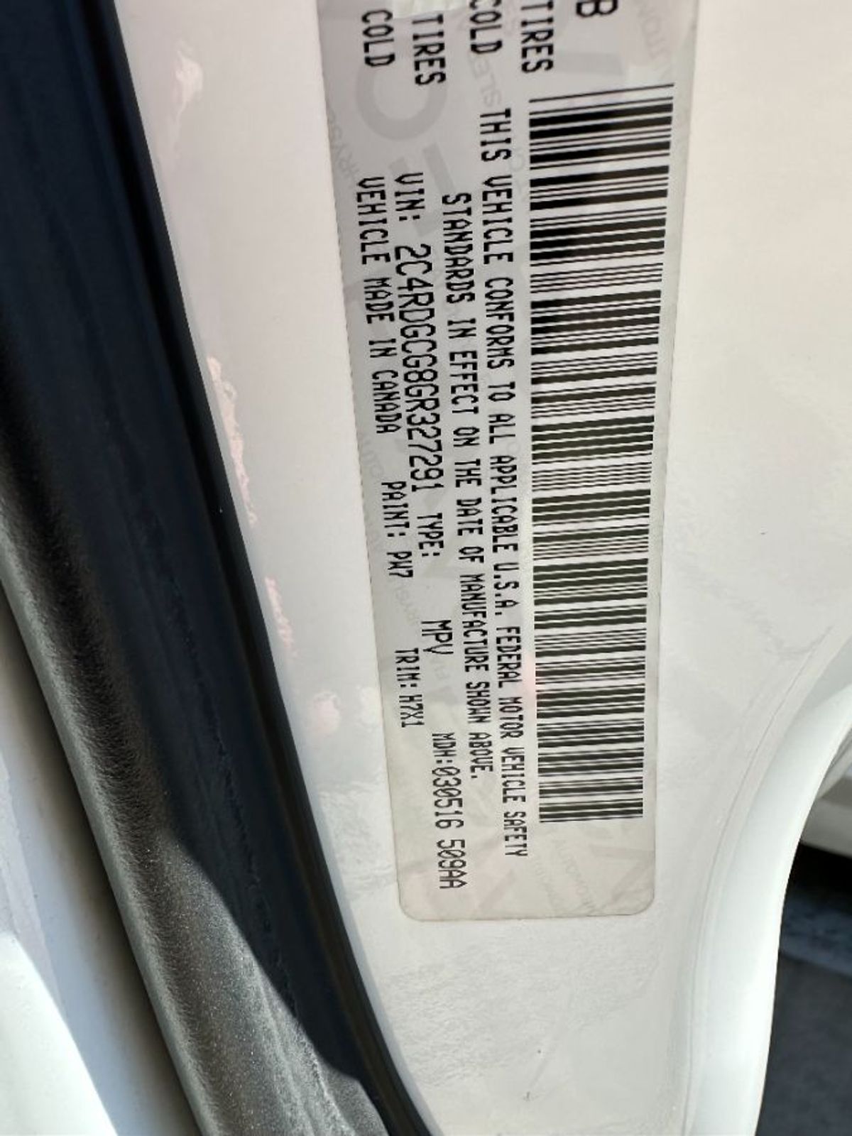 White Dodge Grand Caravan image number 13