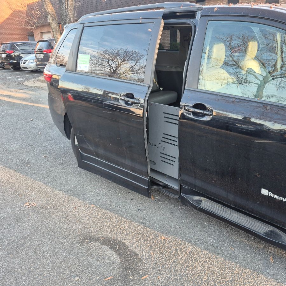 Black Toyota Sienna with Side Entry Automatic Fold Out ramp