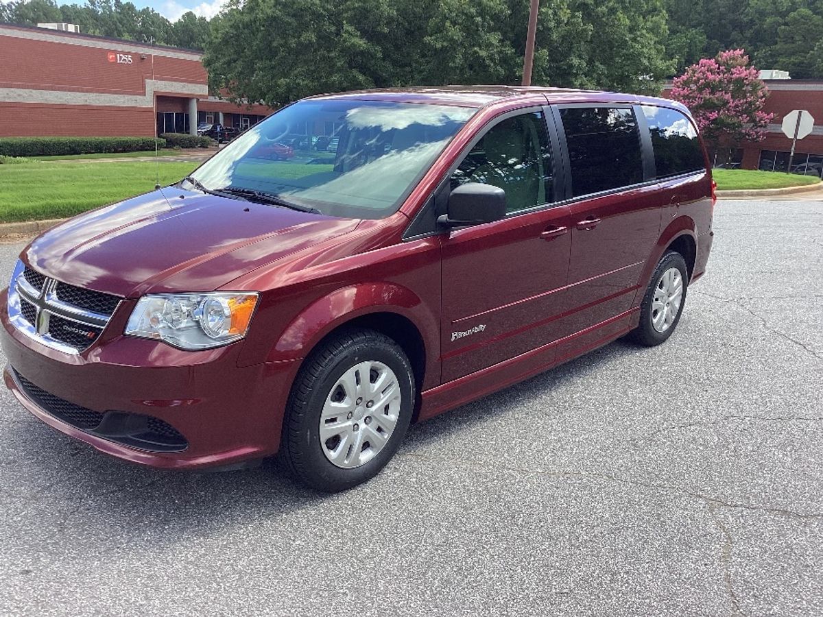 Red Dodge Grand Caravan image number 1