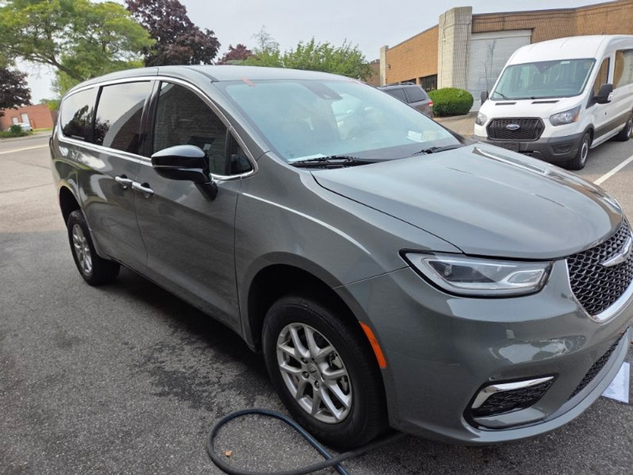 Grey Chrysler Pacifica with Rear Entry Manual Fold Out ramp
