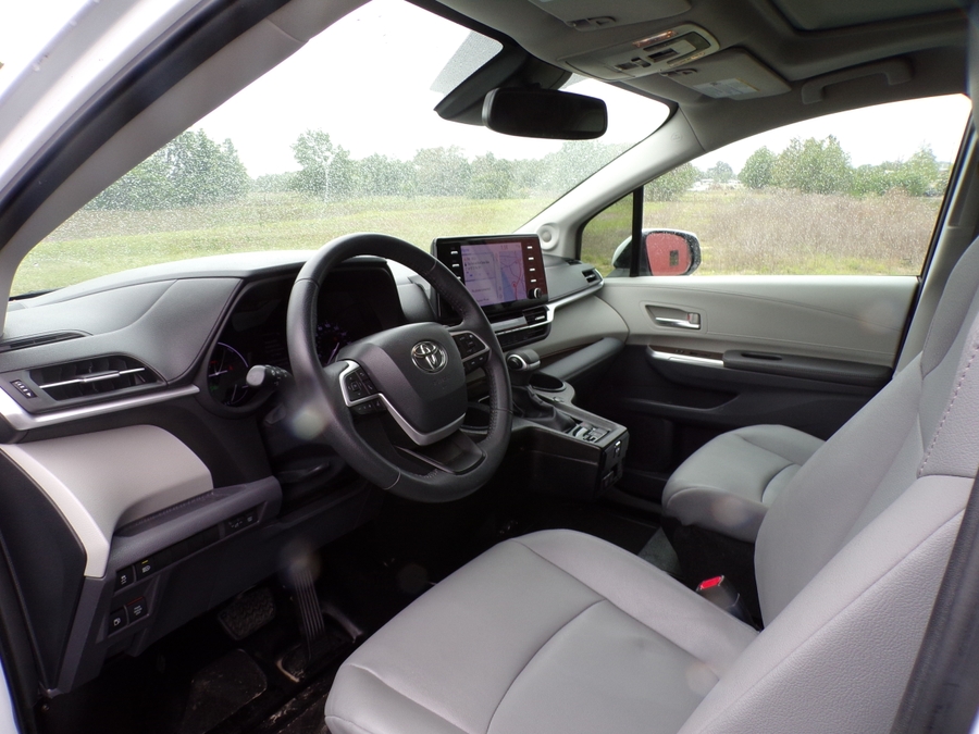 White Toyota Sienna with Side Entry Automatic Fold Out ramp