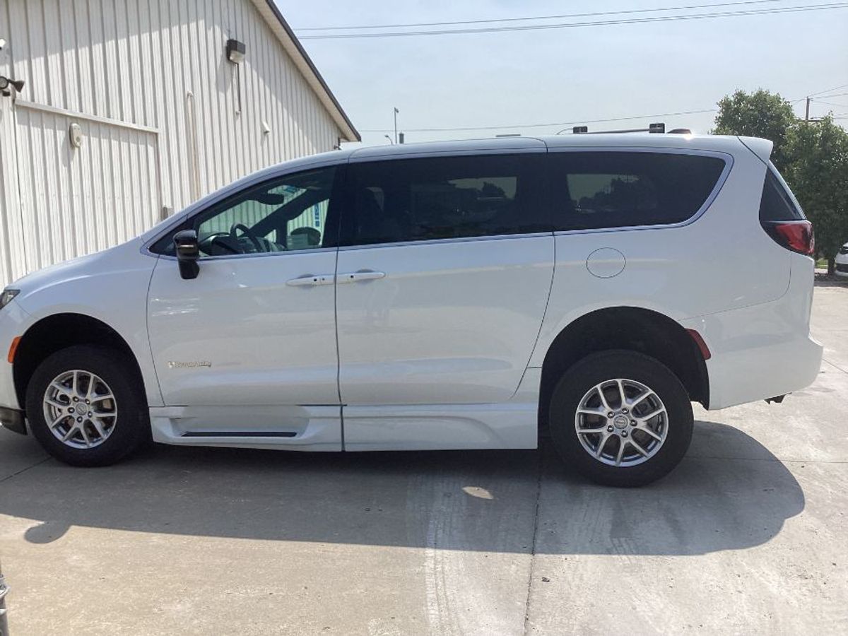 White Chrysler Voyager with Side Entry Automatic Fold Out ramp