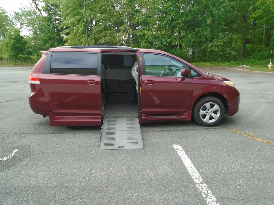 Red Toyota Sienna with Side Entry Automatic Fold Out ramp