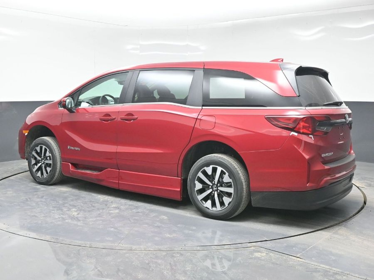 Red Honda Odyssey with Side Entry Automatic In Floor ramp