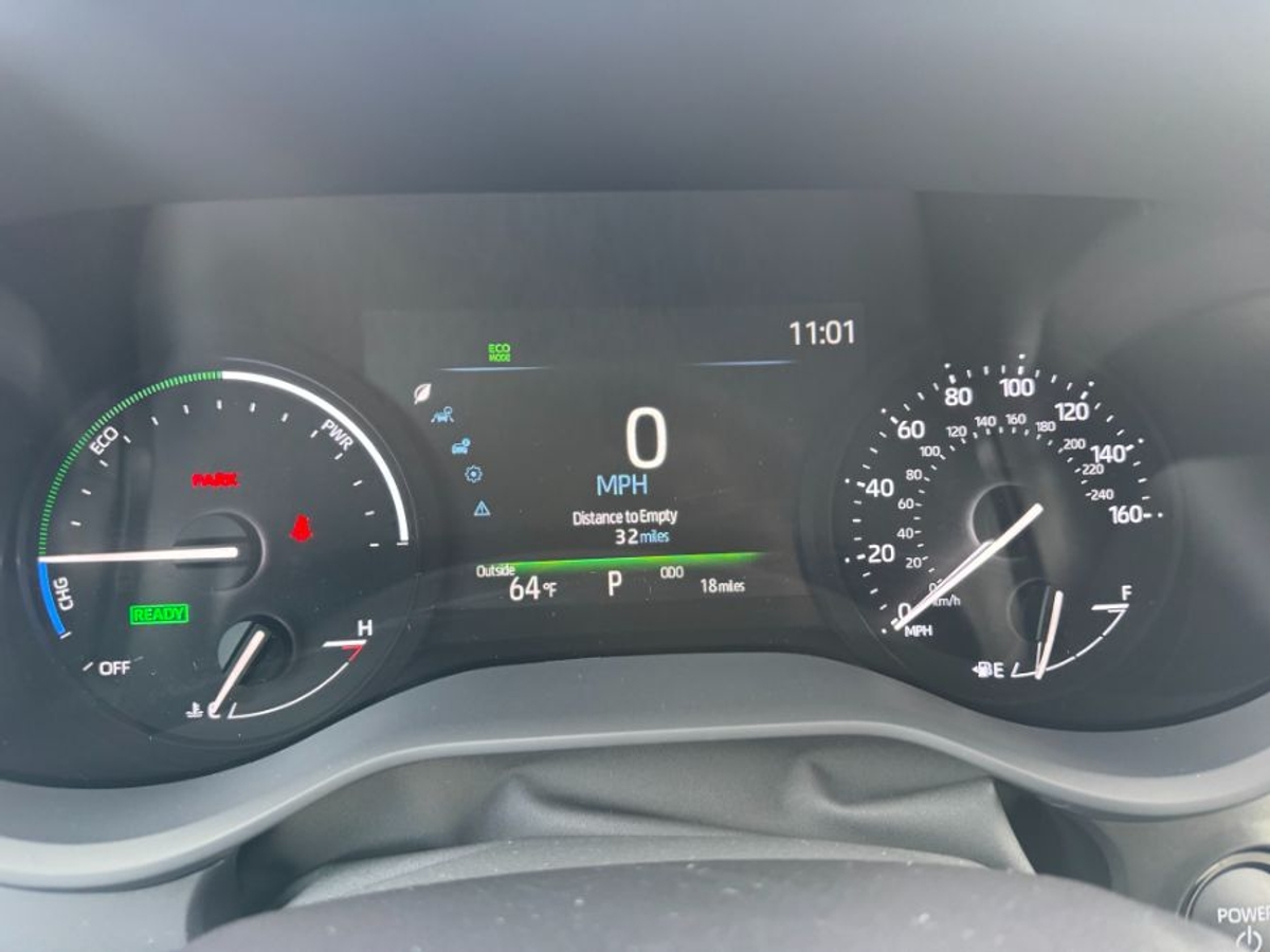 White Toyota Sienna with Rear Entry Manual Fold Out ramp